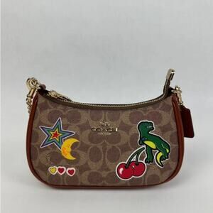 Coach CW321 Teri Mini Crossbody Bag In Sig With Sticker Print IN Tan Multi